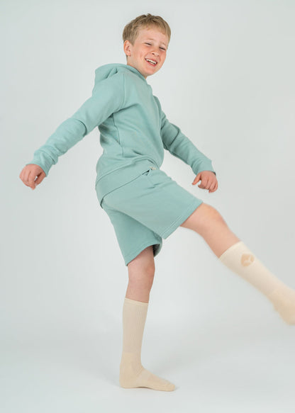 Unser Model Joris ist <strong>150 cm</strong> groß und trägt <strong>Größe 146-152</strong>.#